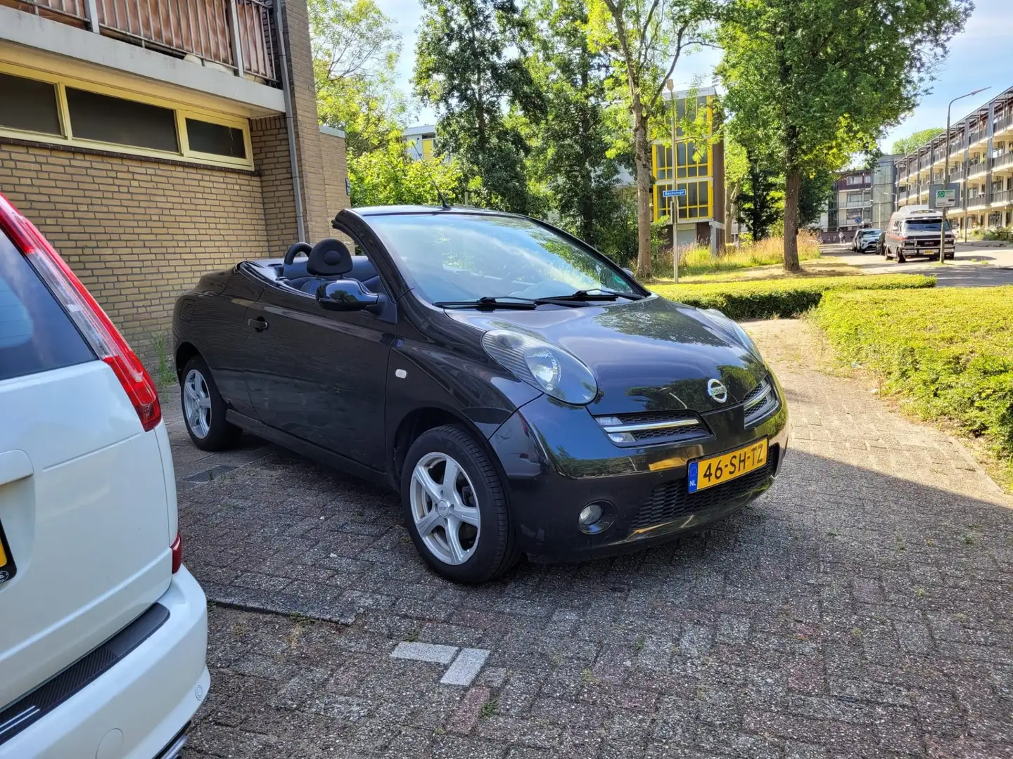 Nissan Micra C+C Cabrio 1.6 uit 2006 +AIRCO +PDC +NAP +APK Zwart - 1