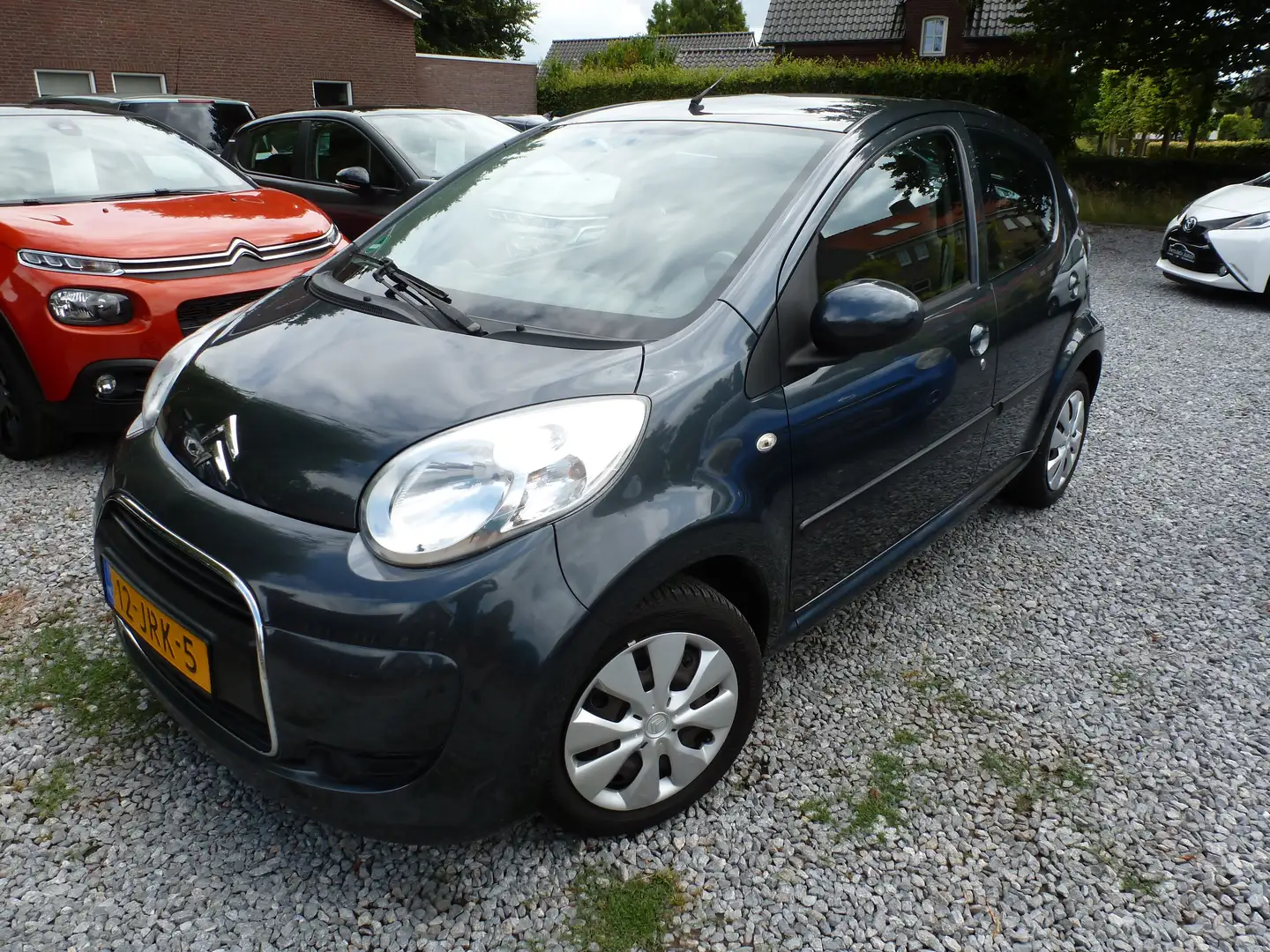 Citroen C1 1.0-12V Ambiance Airco Elec.Pakk 2e Eig N.A.P. !! Grijs - 1