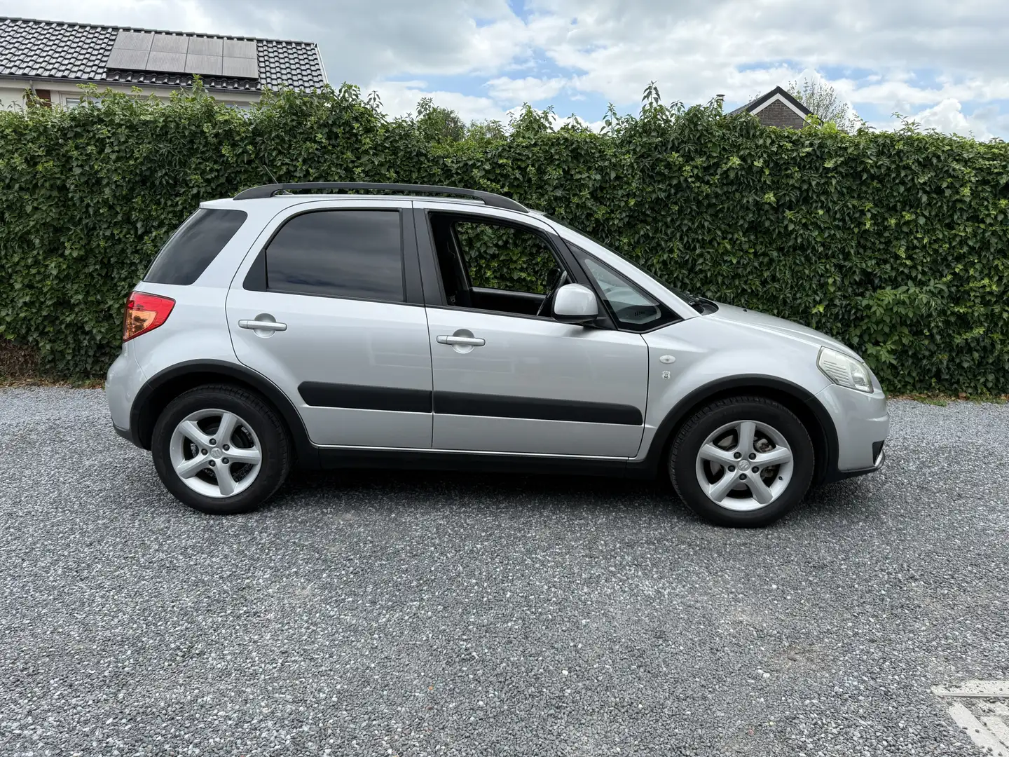Suzuki SX4 1.6 Shogun | Navi | Airco | Elekt. Ramen | LMV | P Grijs - 2