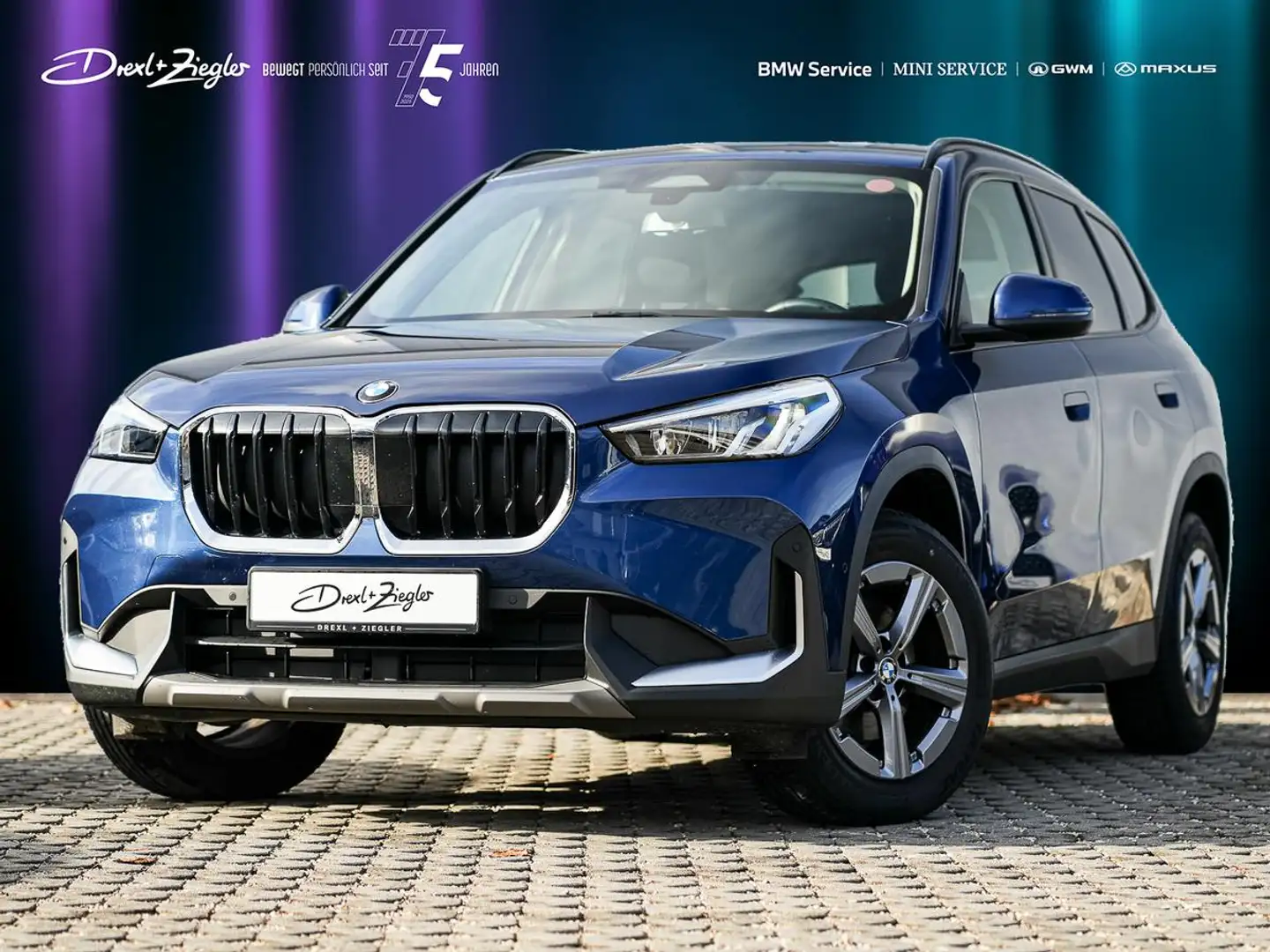 BMW X1 sDrive18i AHK PANO RFK SpSitze TravelPaket Blau - 1