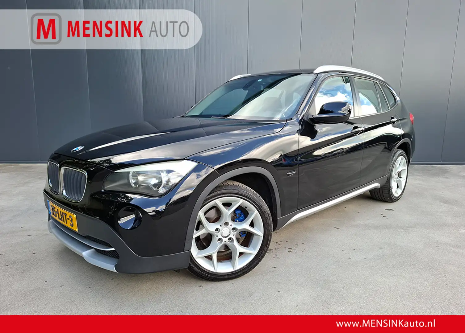 BMW X1 sDrive18i 150 PK Executive NAVI CRUISE ECC AFNB TR Zwart - 1