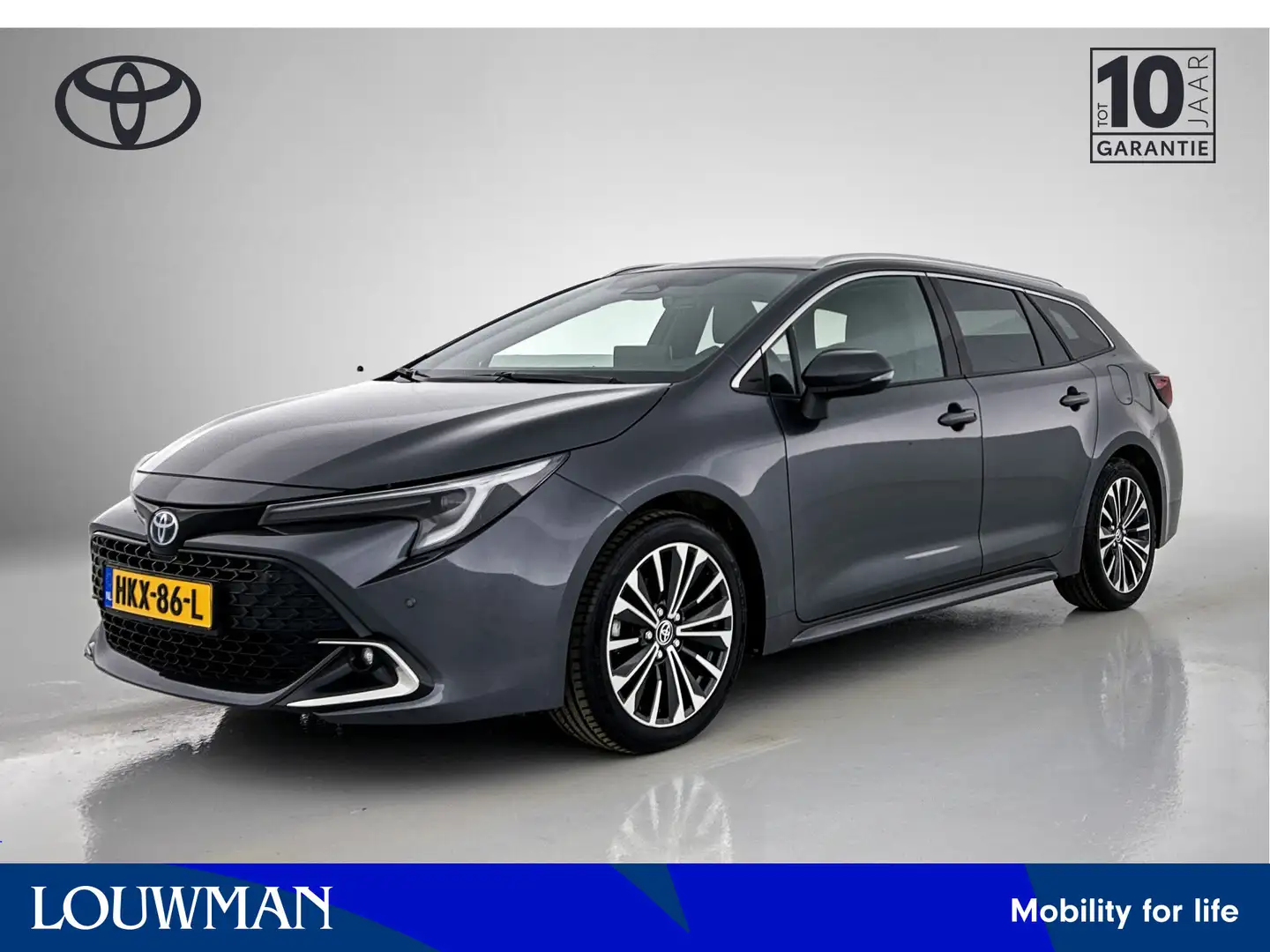 Toyota Corolla Touring Sports Hybrid 200 Dynamic Limited | Stoelv Gris - 1