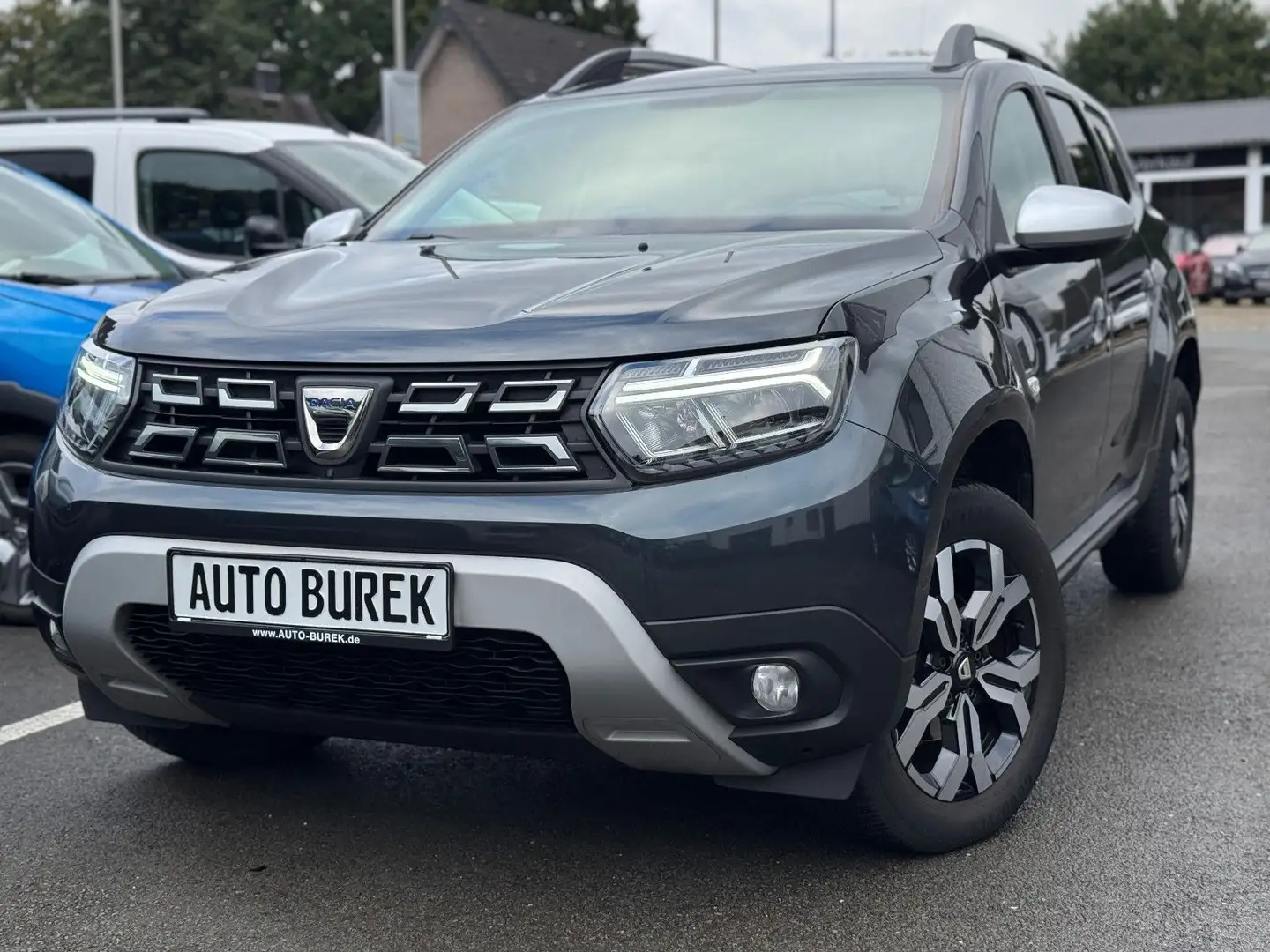 Dacia Duster II Aut. Prestige Navi Shz 360° 1Hd 17"Alu Gris - 1