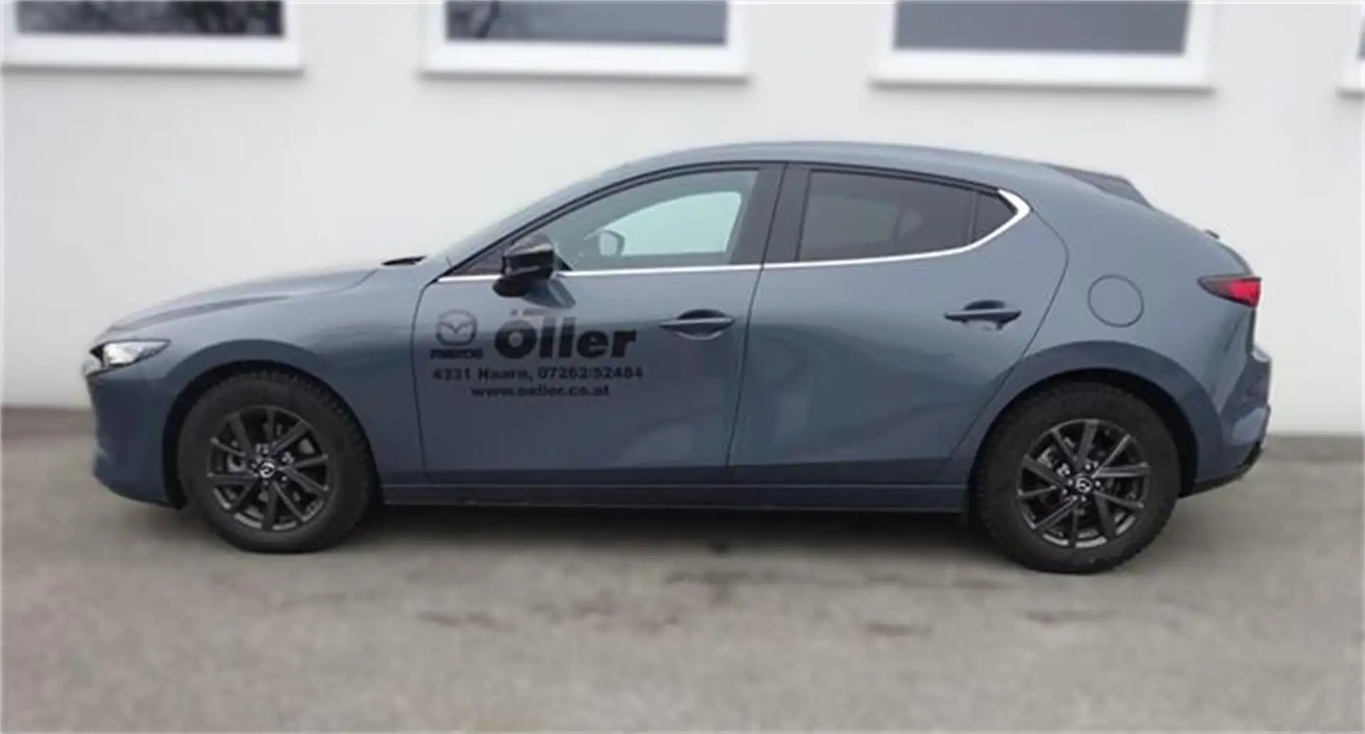 Mazda 3 e-Skyactiv-G140 Homura Grau - 1