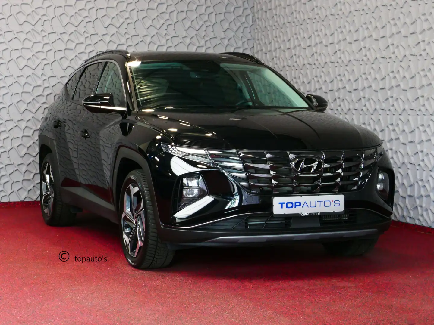 Hyundai TUCSON 1.6 T-GDI PHEV 265PK 19''LMV 4WD LED STUUR/STOEL V Zwart - 1