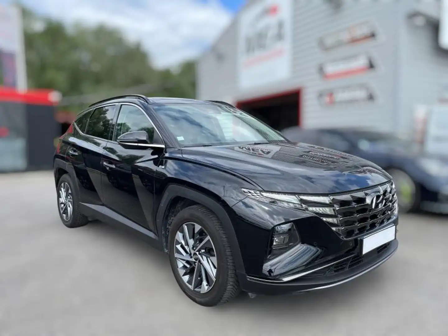 Hyundai TUCSON 1.6T 180 HYBRID 48V DCT-7 HTRAC DREAMLINE PANO Rood - 1
