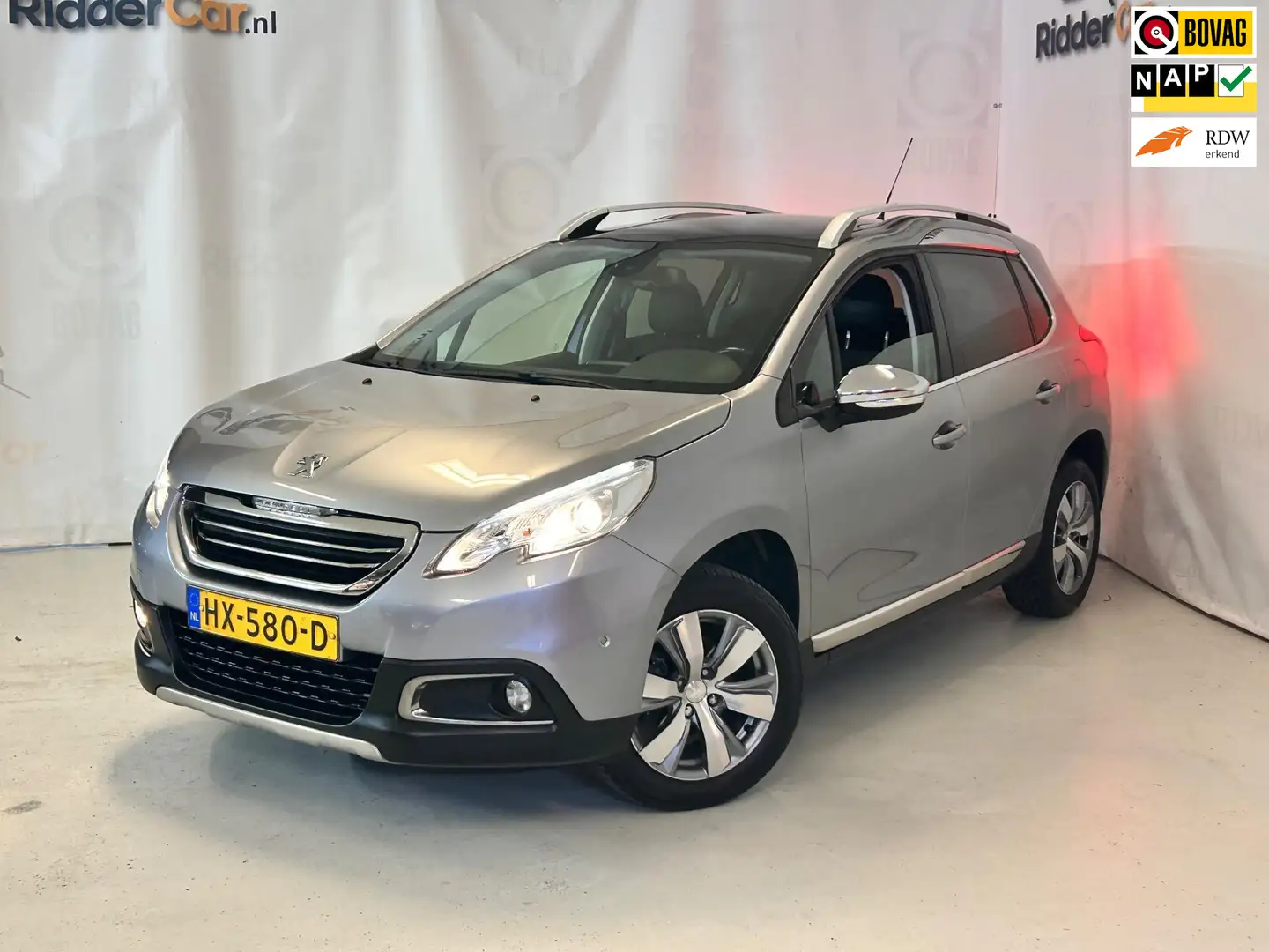 Peugeot 2008 1.2 PureTech Allure|NAP|AIRCO|CRUISE|PARK SENS|ELE Gris - 1