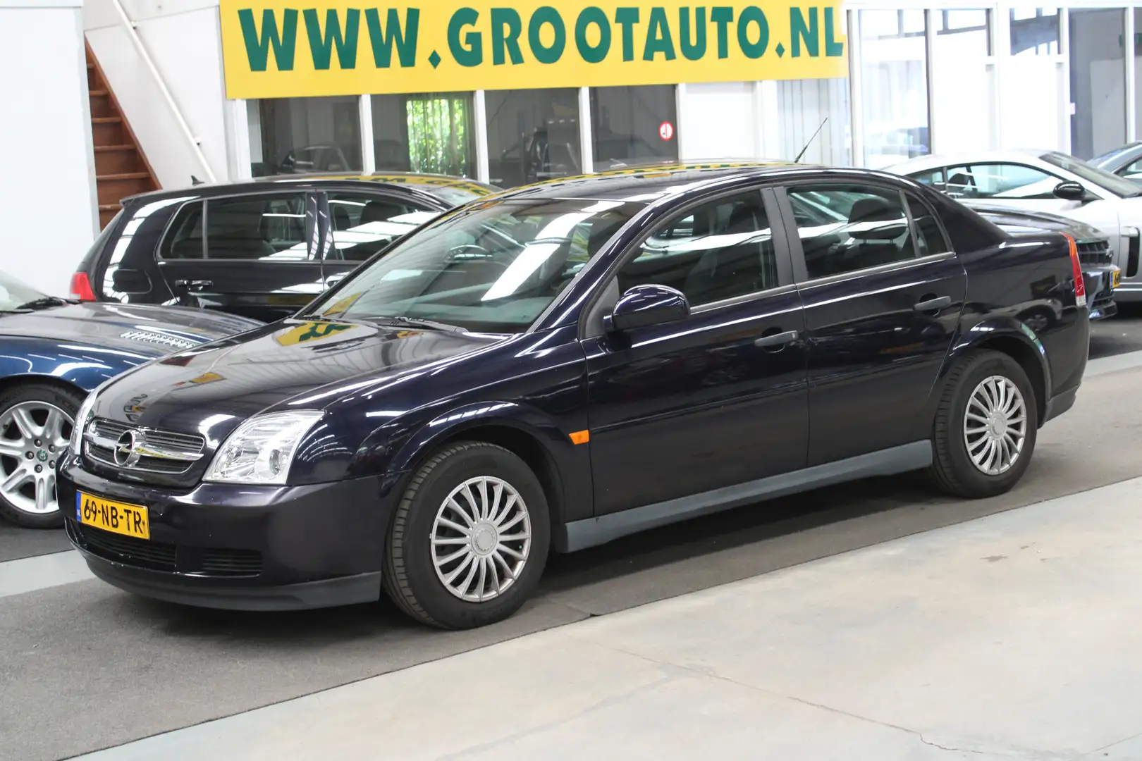 Opel Vectra 1.8-16V Comfort Navigator 1e Eigenaar, Airco, Stuu Bleu - 1