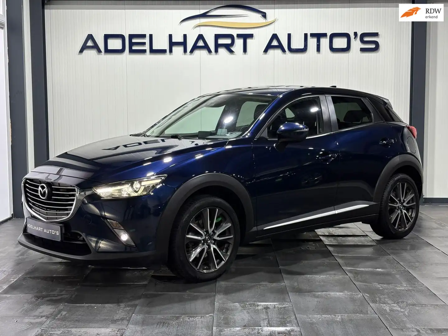 Mazda CX-3 2.0 SkyActiv-G 120 SkyLease GT Automaat / Navigati Bleu - 1