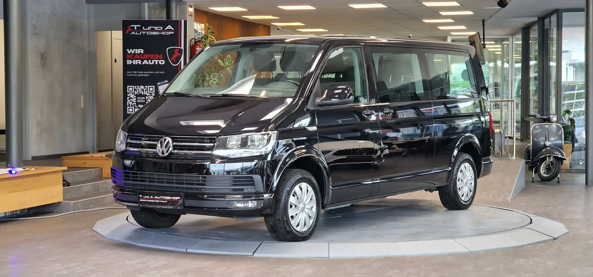 Volkswagen T6 Caravelle 2.0 TDI Kombi 9-Sitzer DSG *AHK*Navi*Sitzheizung* Schwarz - 1