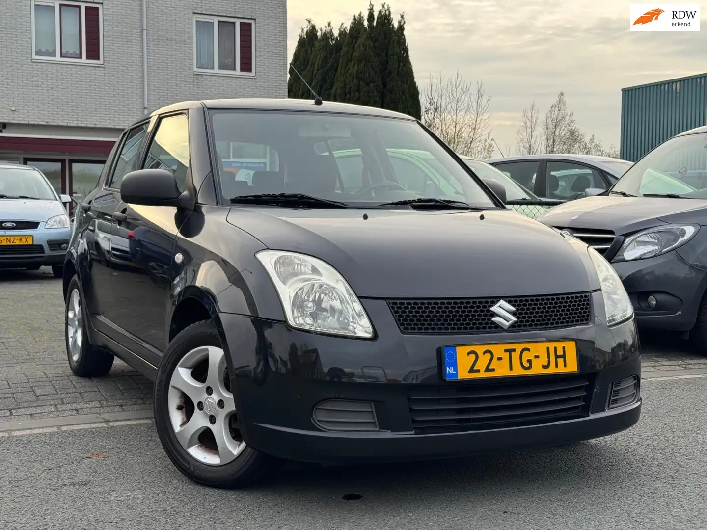 Suzuki Swift 1.3 GA/5drs/APK 12-2026 Schwarz - 1