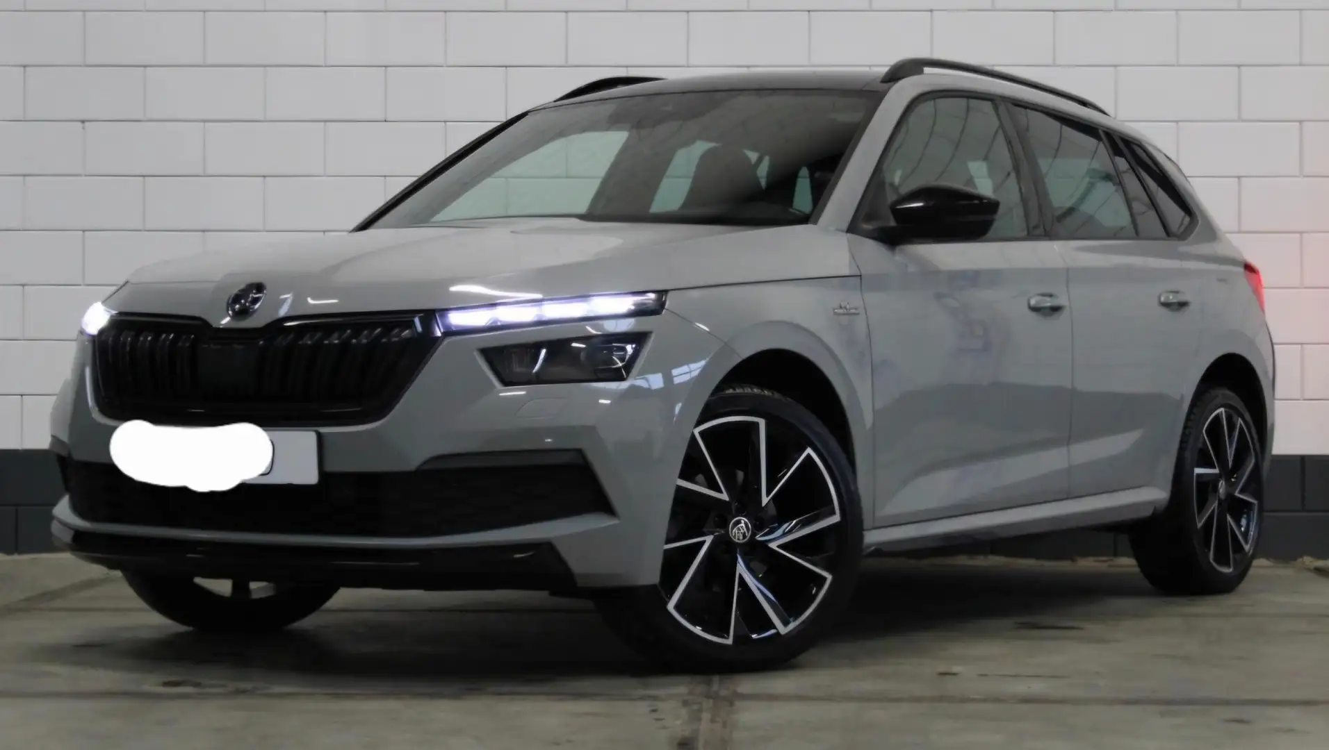Skoda Kamiq 1.0 TSI DSG Monte Carlo | Pano Virtual kamiq Grijs - 1