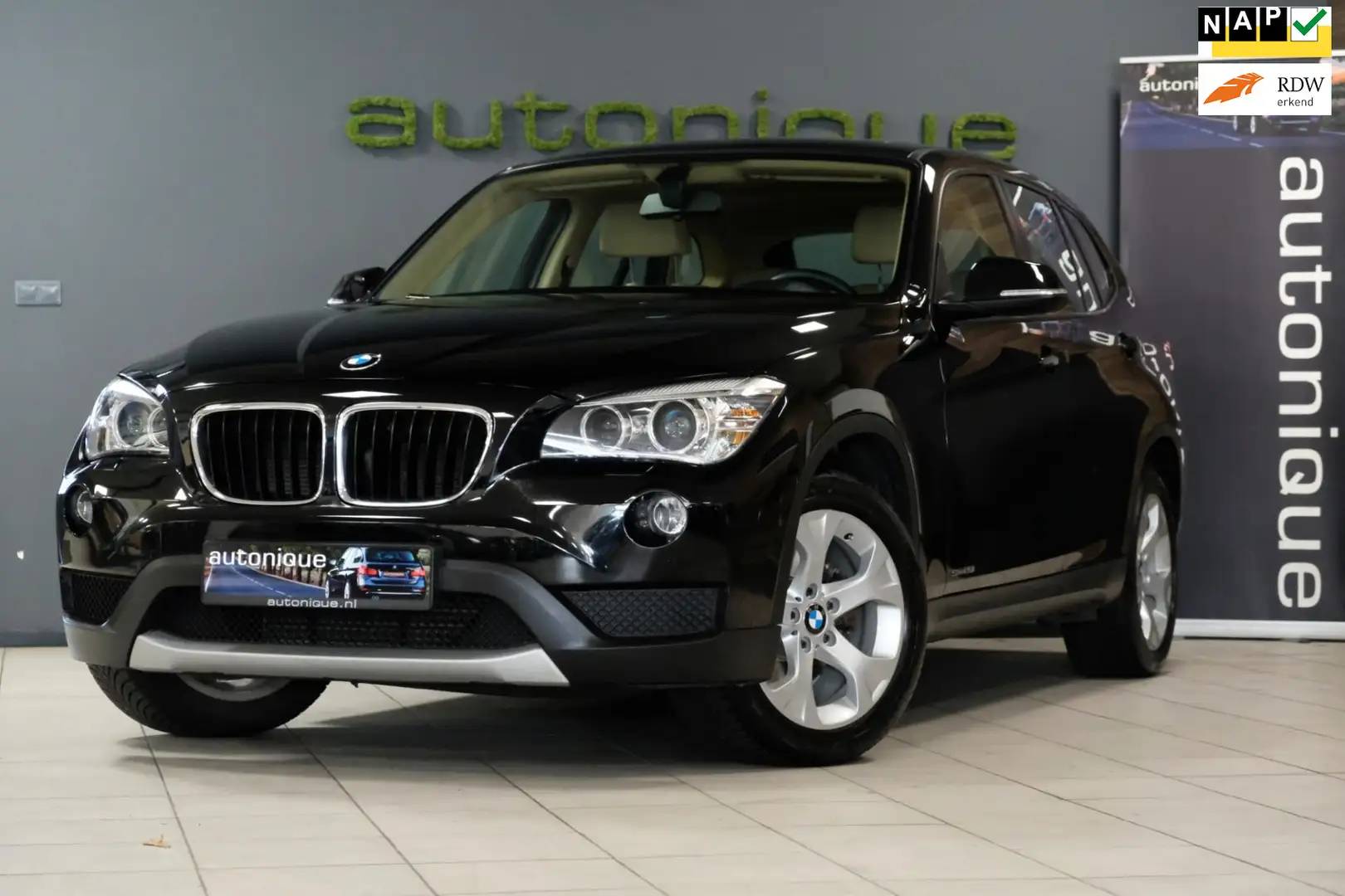 BMW X1 SDrive20i Executive 185pk! *PANORAMADAK/Sportleder Zwart - 1