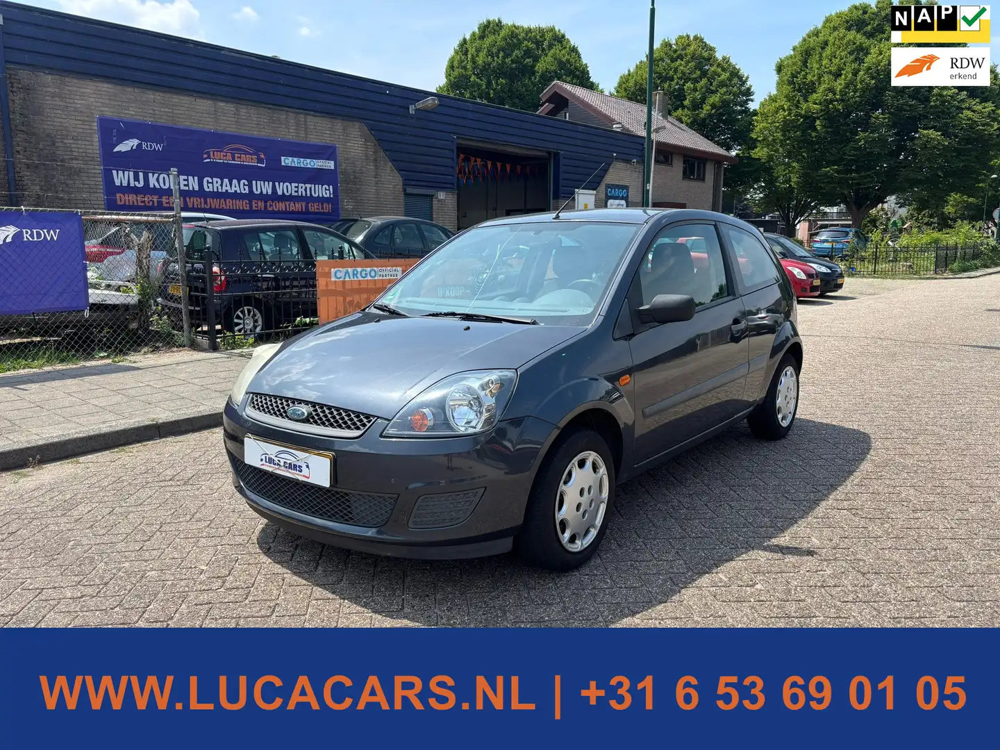 Ford Fiesta 1.4-16V Ambiente Grijs - 1
