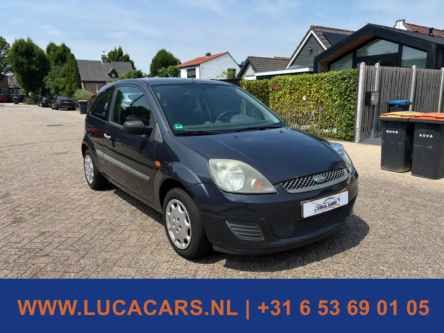 Ford Fiesta 1.4-16V Ambiente Grijs - 2