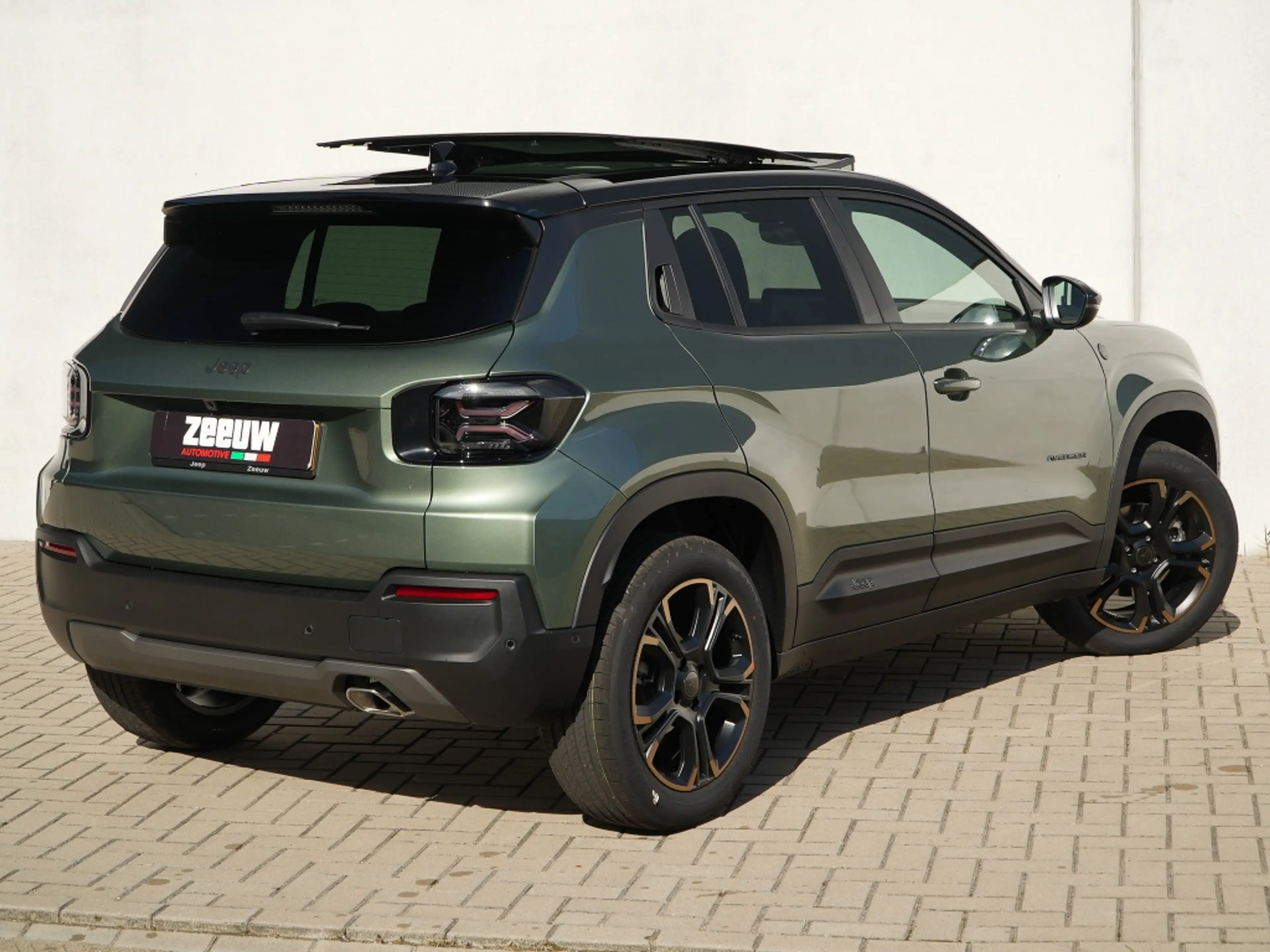 Jeep Avenger 1.2 e-Hybrid 85th Anniversary | Schuifdak | Winter — photo 9
