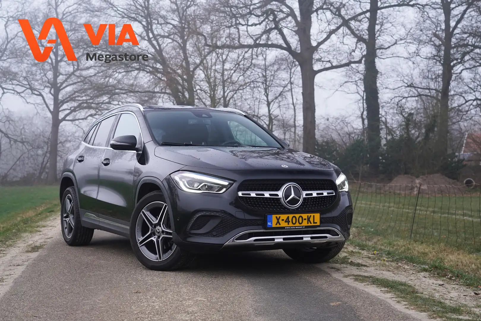 Mercedes-Benz GLA 180 Luxury AMG 18" | Camera | LED | PDC | Stoelverw. | Noir - 1