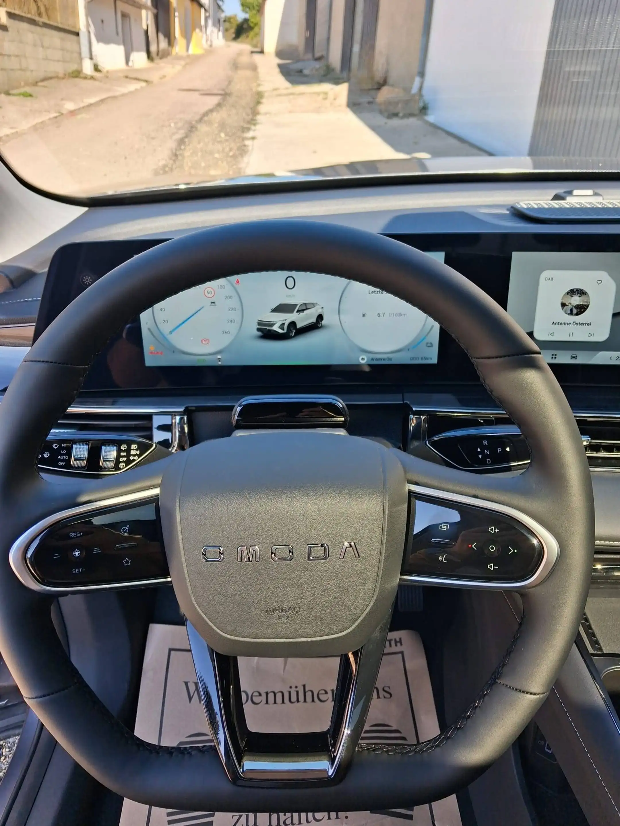 Omoda 5 Hybrid SHS Premium-Line *in Anlieferung* — photo 12