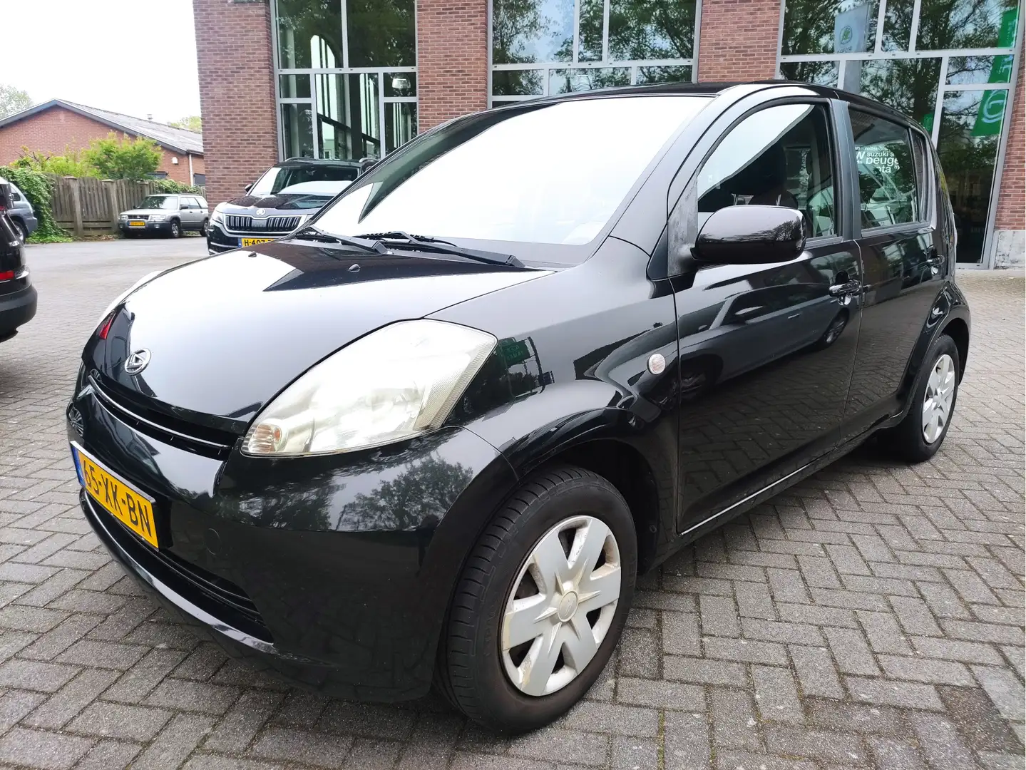 Daihatsu Sirion 2 1.0-12V Trend E.ruiten V+A - Centr.vergrendeling Noir - 1
