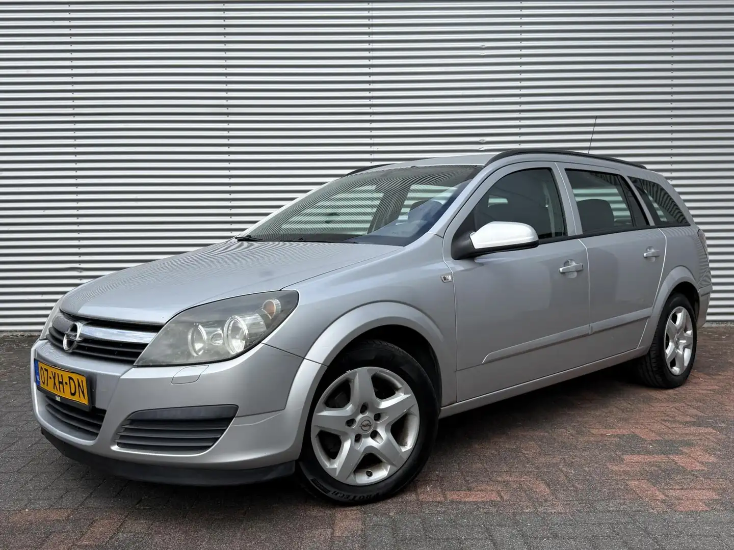 Opel Astra Wagon 1.6 Business Airco Cruise NL Auto 2007 Grijs - 1