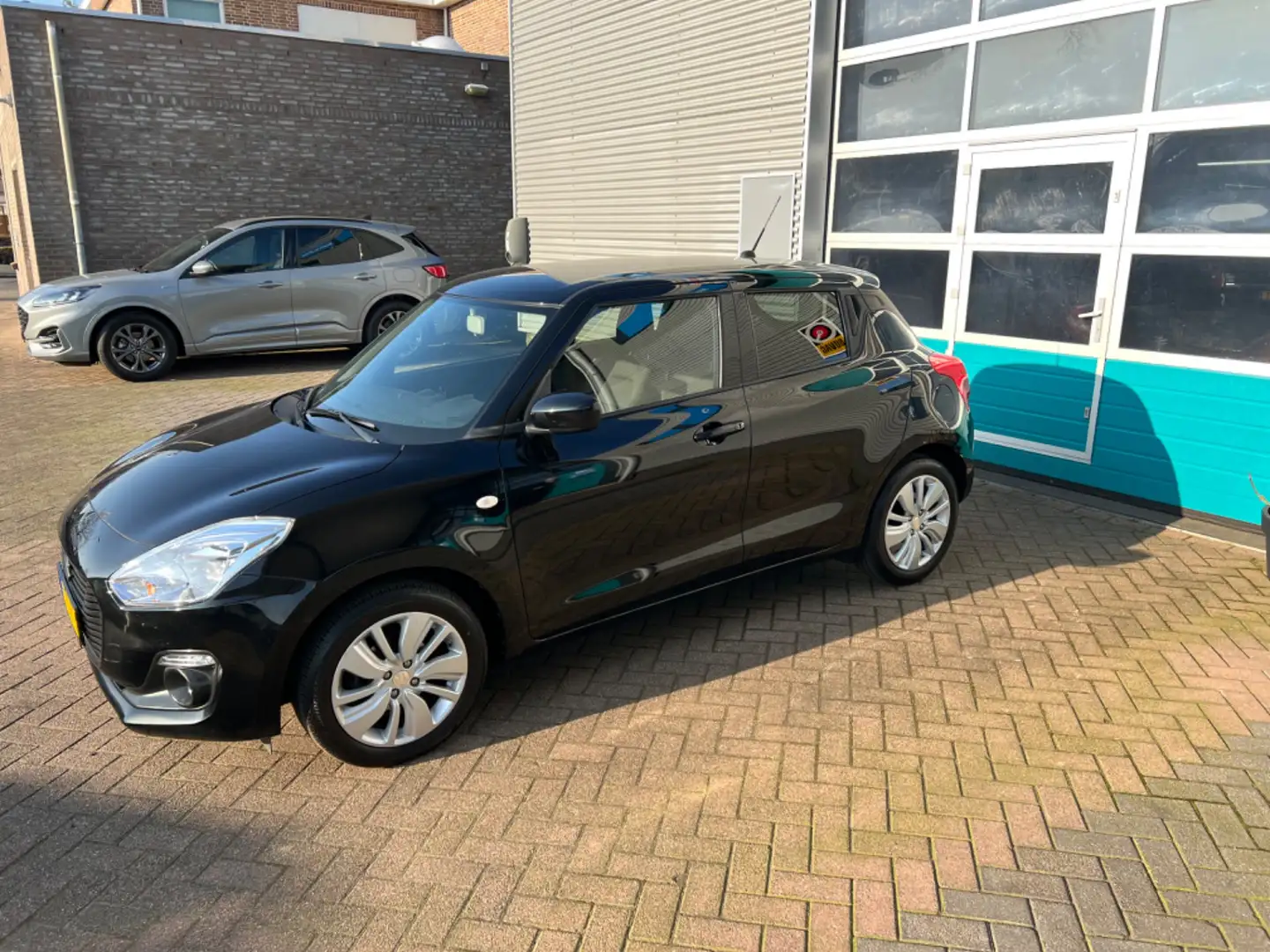 Suzuki Swift 1.2 DualJet 90pk Comfort Nero - 1