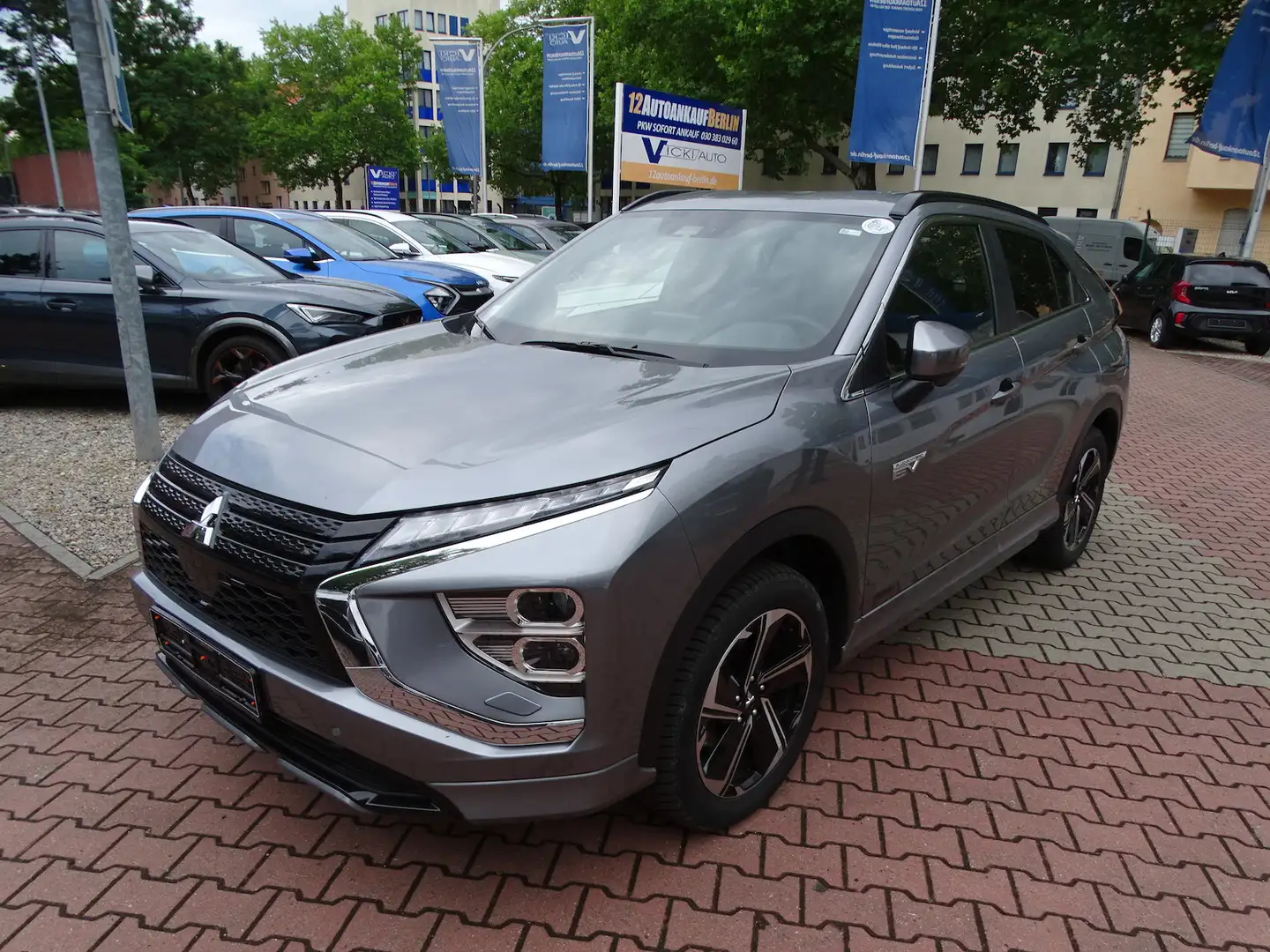 Mitsubishi Eclipse Cross 2.4 Plus Select Black Hybrid 4WD Leder/Alcan Gris - 1