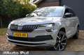 Skoda Karoq 1.5 TSI ACT Sportline Business Automaat/Navi/Led/P Grijs - thumbnail 1