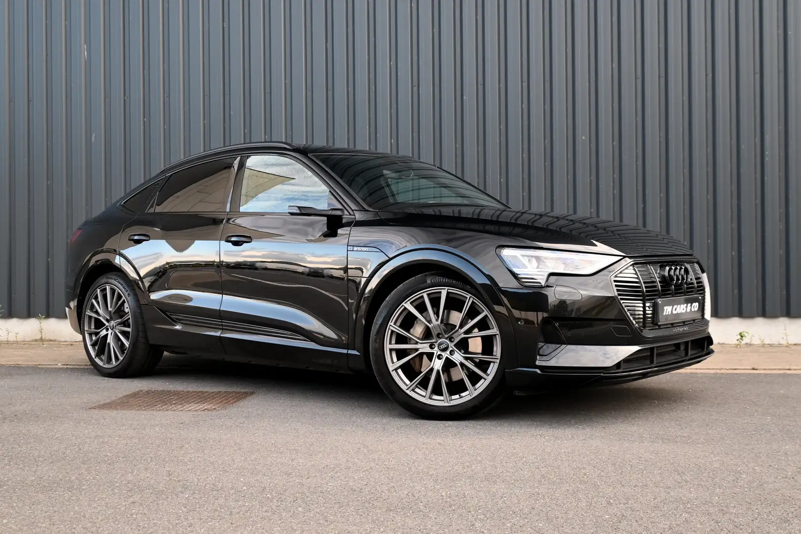 Audi e-tron 55SLine Quattro ACC-HUD-DCC-Pano-Cam-Trekh-BTW-B&O Noir - 1