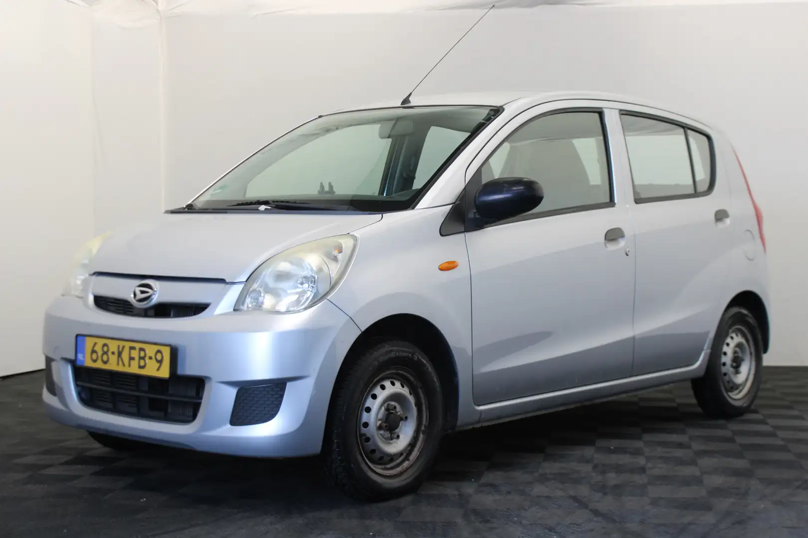 Daihatsu Cuore 1.0 Clever Zie tekst! Gri - 1