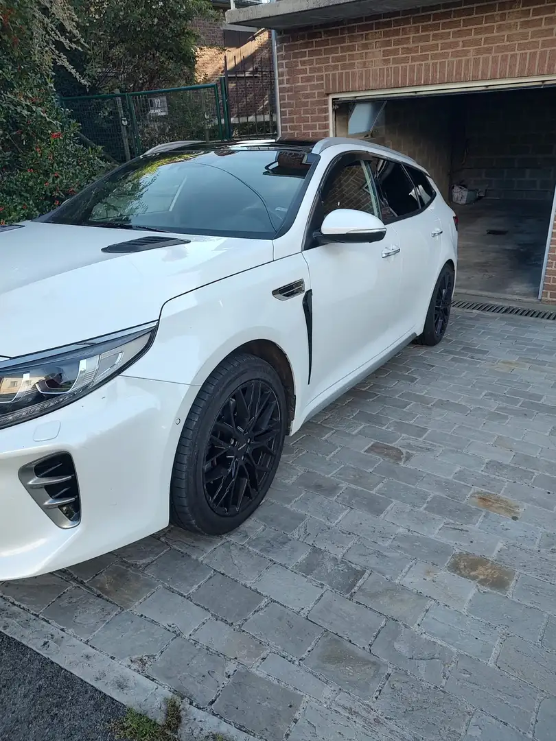 Kia Optima Optima SW 1.7 CRDi GT Line ISG DCT Белый - 1