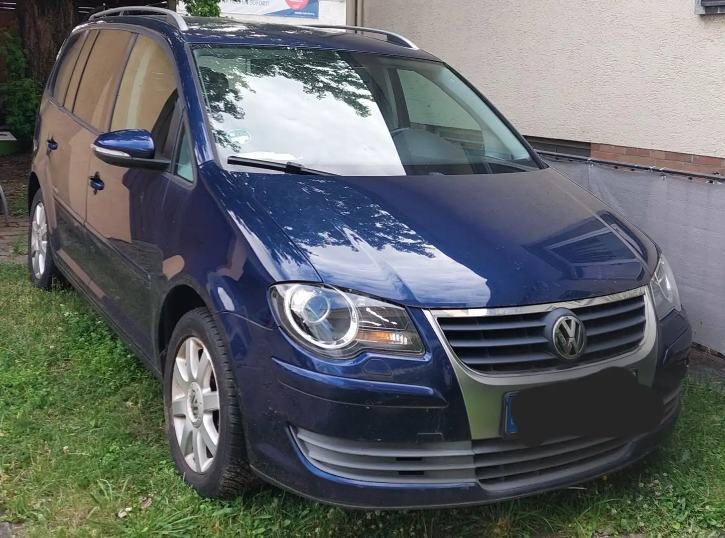 Volkswagen Touran Freestyle Blau - 1
