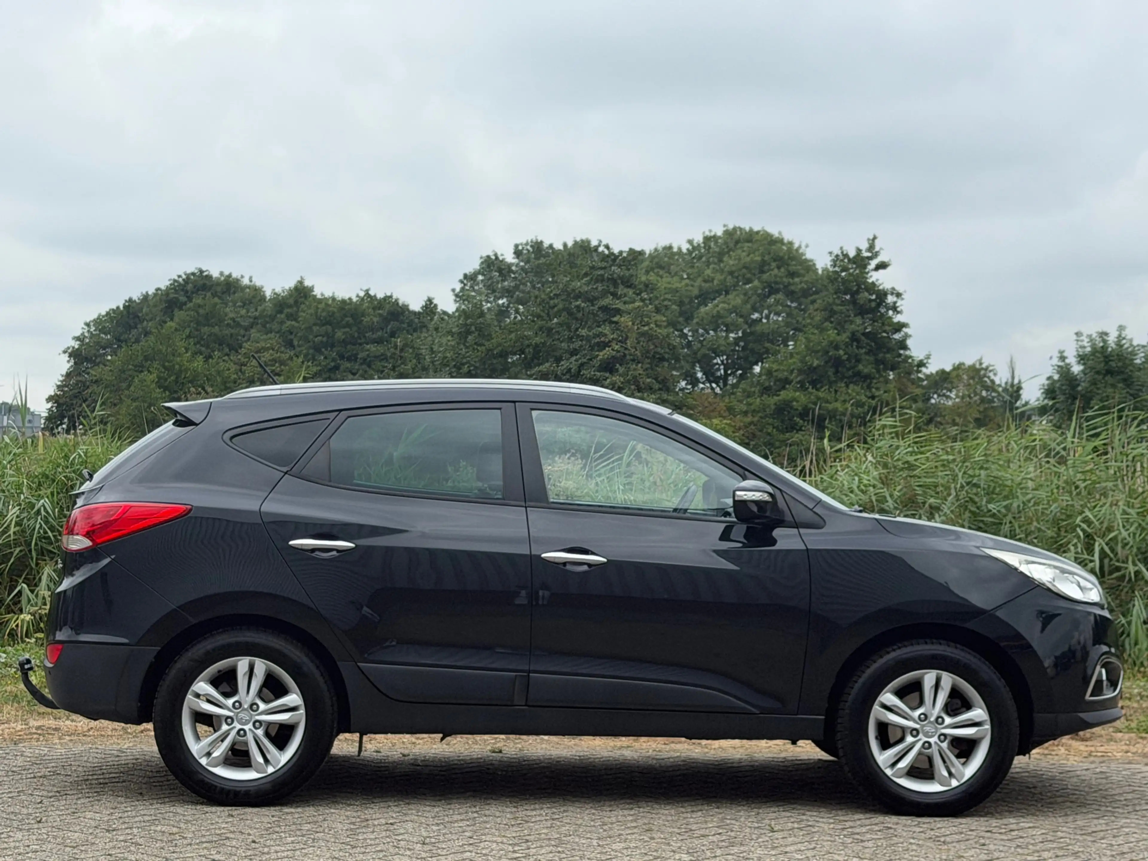 Hyundai iX35 2.0i Style - Black Pearl - Leder/Multimedia/Trekha — photo 31
