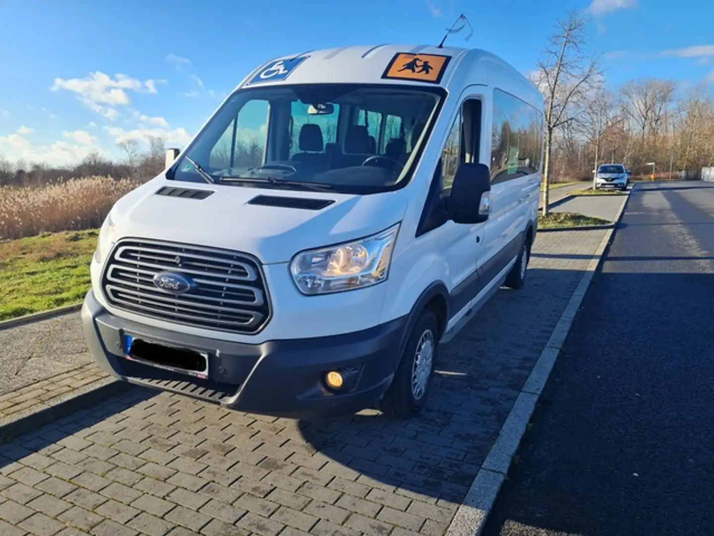 Ford Transit HOCH+LANG+ RAMPE+ 9 SITZE+KLIMA+STANDHZG Weiß - 1