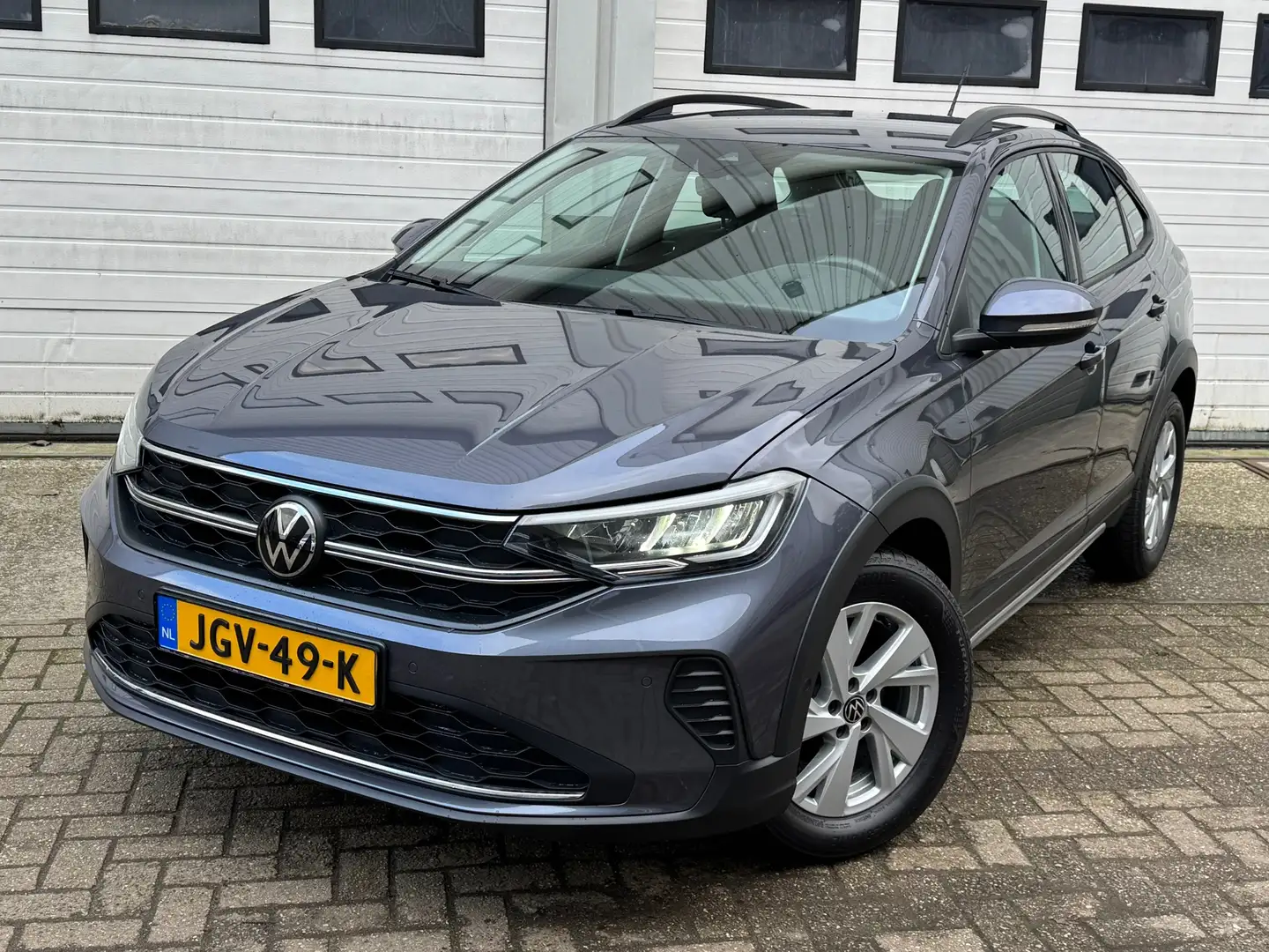 Volkswagen Taigo 1.0 TSI Life Business led/navi/carplay/camera/acc/ Grijs - 1