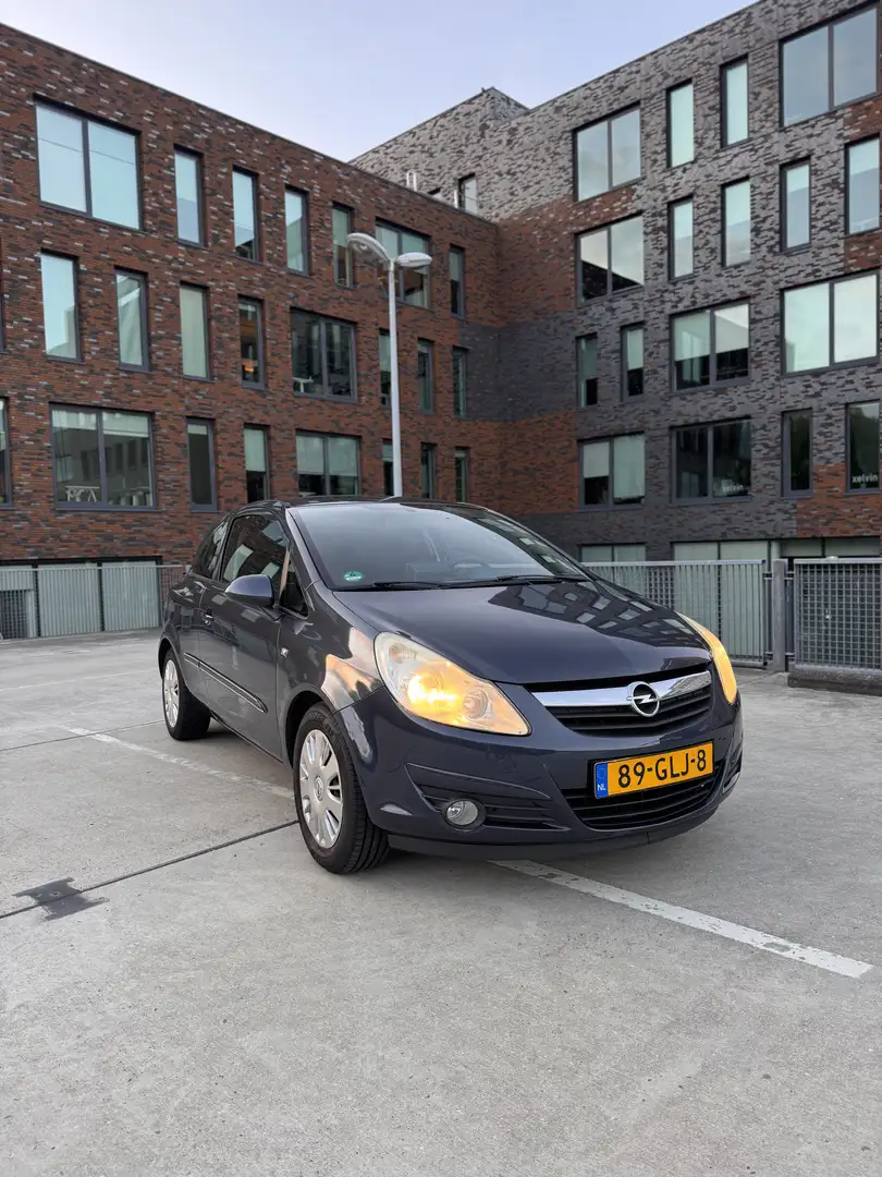 Opel Corsa 1.2-16V Enjoy Grijs - 2
