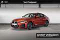 BMW i4 eDrive40 High Executive | Selections BMW i4 eDrive Oranje - thumbnail 1
