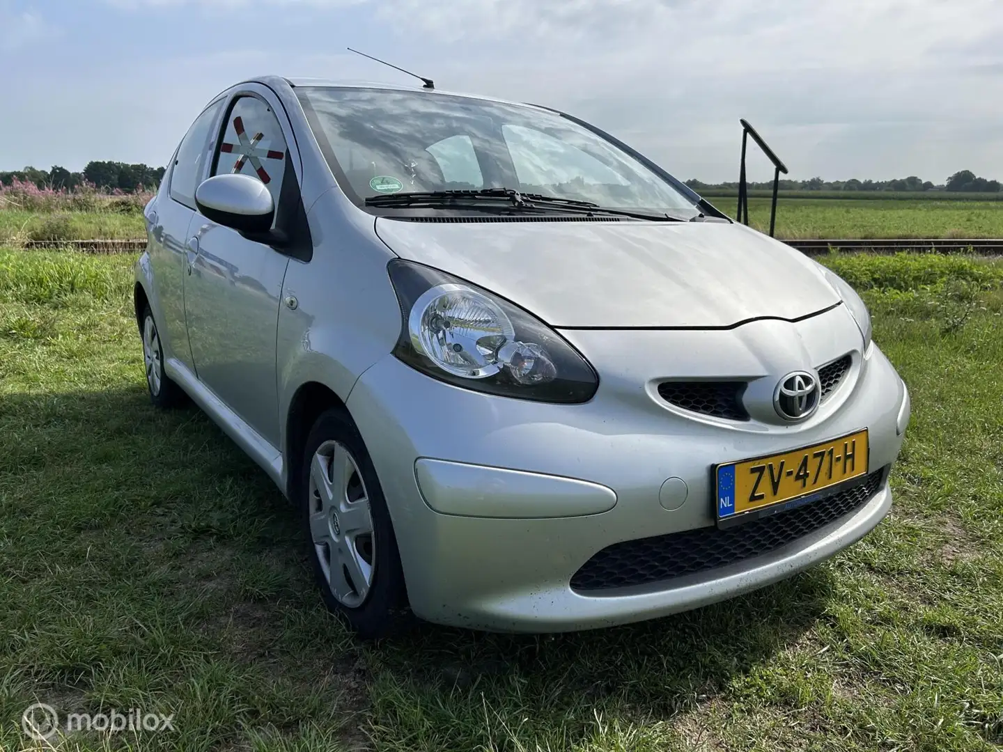 Toyota Aygo 1.0-12V + AIRCO NIEUWE APK 5-DEURS Grigio - 2
