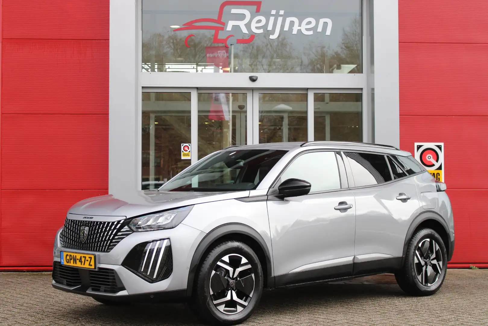 Peugeot 2008 1.2 100PK ALLURE | NAVIGATIE | APPLE CARPLAY/ANDRO Gris - 1