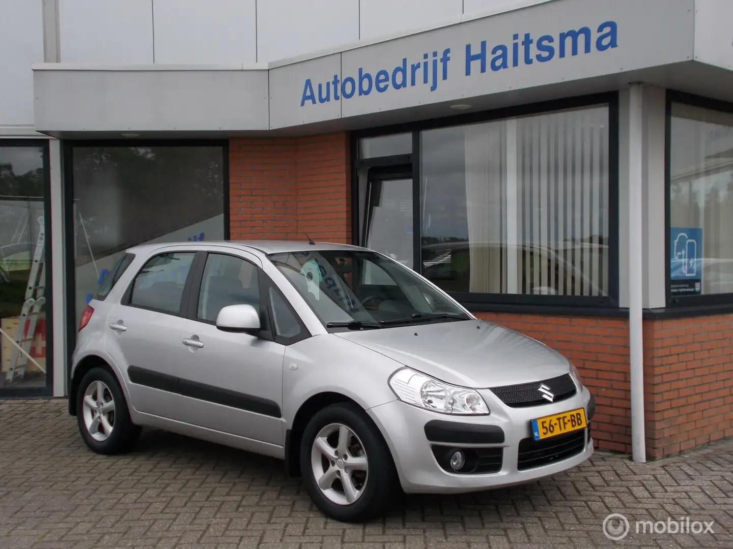 Suzuki SX4 1.6 Exclusive Automaat | Cruise ctrl | Clima Gris - 1