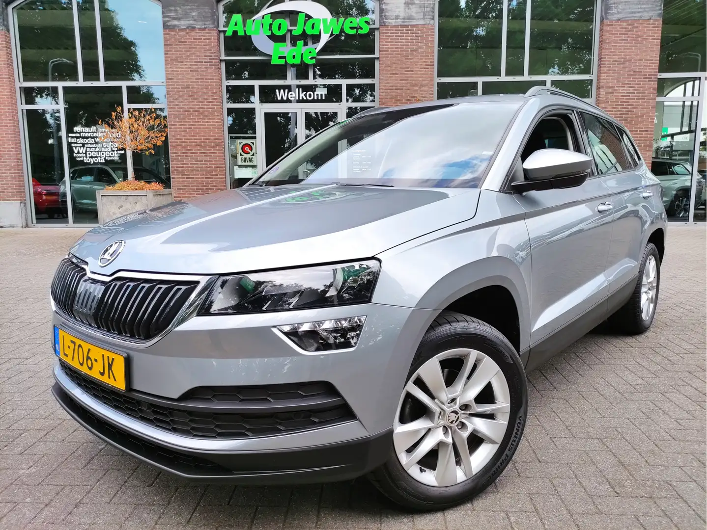 Skoda Karoq 1.0 TSI Business Edition 17Inch LMV - Parkeersenso Grijs - 1
