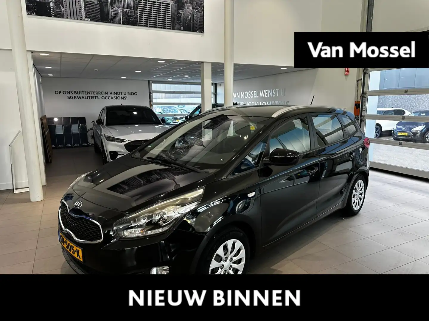 Kia Carens 1.6 GDi ComfortLine 7 PERSOONS | TREKHAAK | NAVI | Zwart - 1