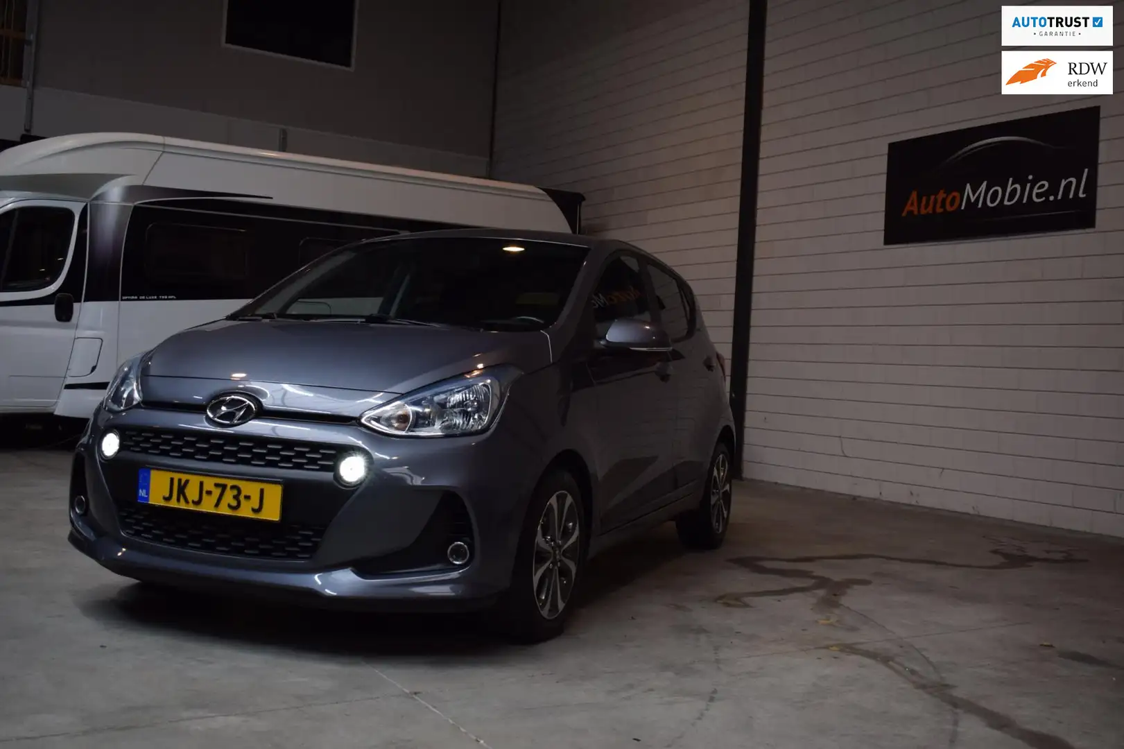 Hyundai i10 1.2 Comfort 4 cilinder Smart Pack Grijs - 1