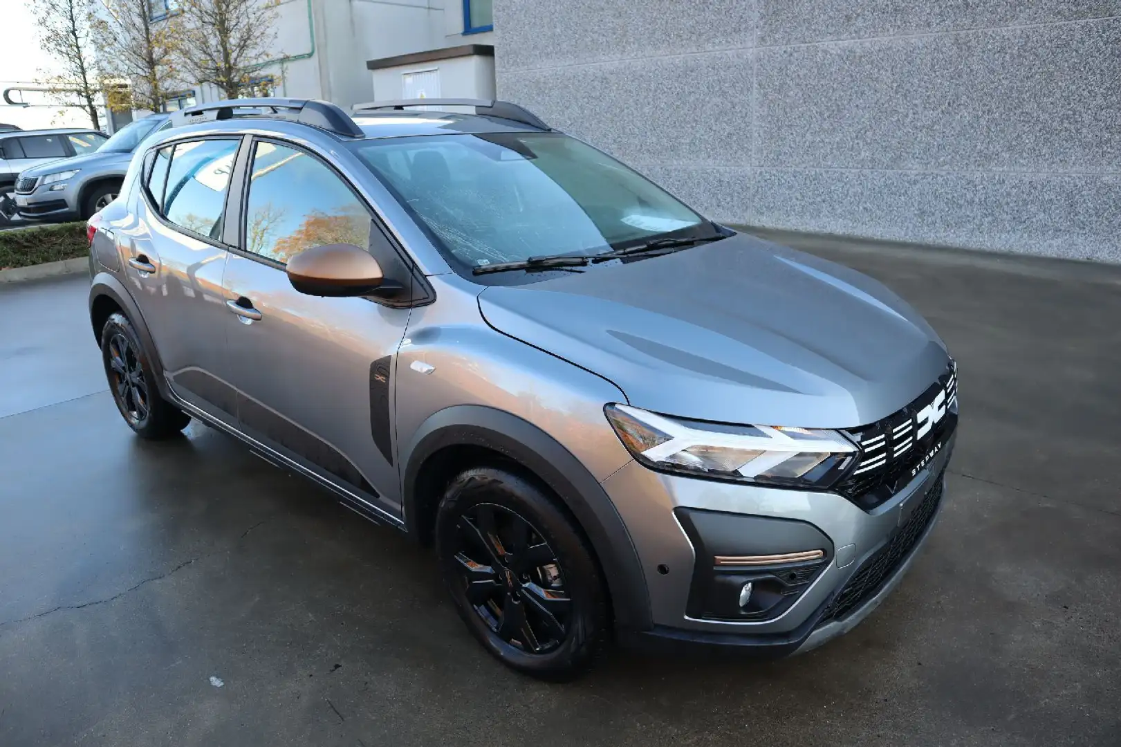 Dacia Sandero 1.0 Benz Gris - 1