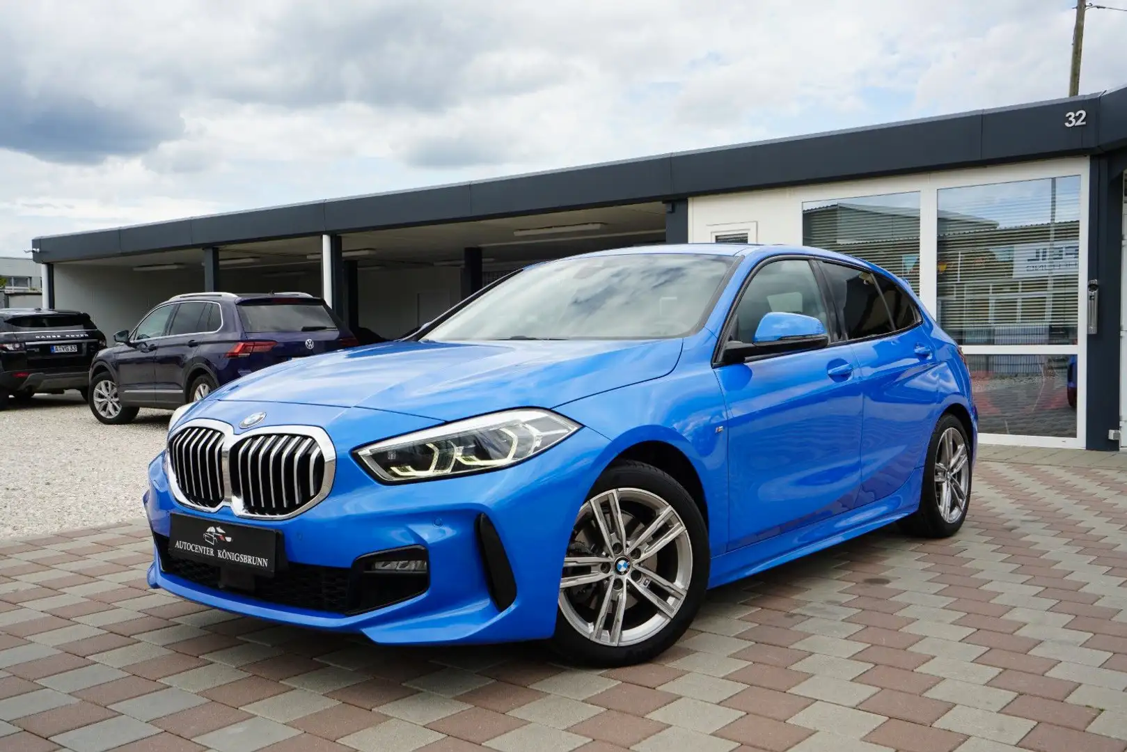 BMW 118 i*M Sport*1.Hand*Head-UP*AHK*ACC*Dashcam*LED* Blauw - 1