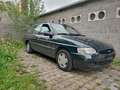 Ford Escort Of ruilen tegen brommer Grün - thumbnail 1