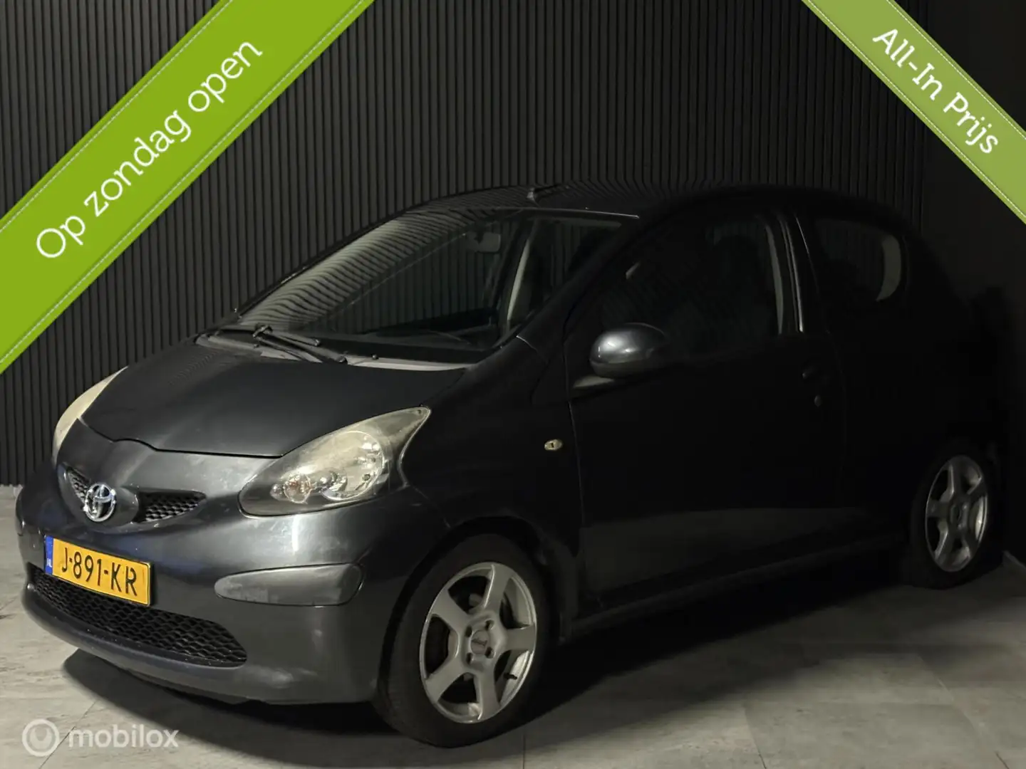 Toyota Aygo 1.0-12V - Airco - Elek pakket - Grau - 1