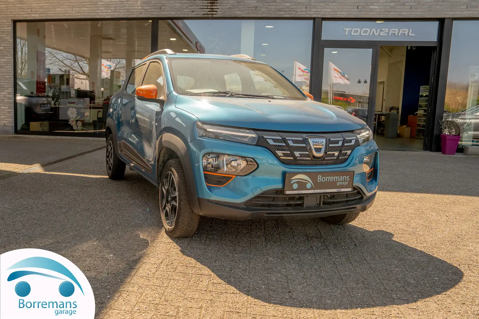 Dacia Spring 27 KWH COMFORT PLUS NAVI/BLUETOOTH/ LEDER/... Bleu - 1
