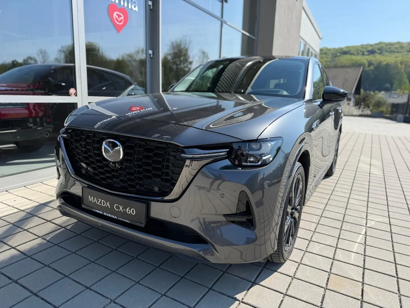 Mazda CX-60 2.5L e-SKYACTIV PHEV AWD HOMURA CON/DRI/COM/PAN Aut. SUV Grau - 2