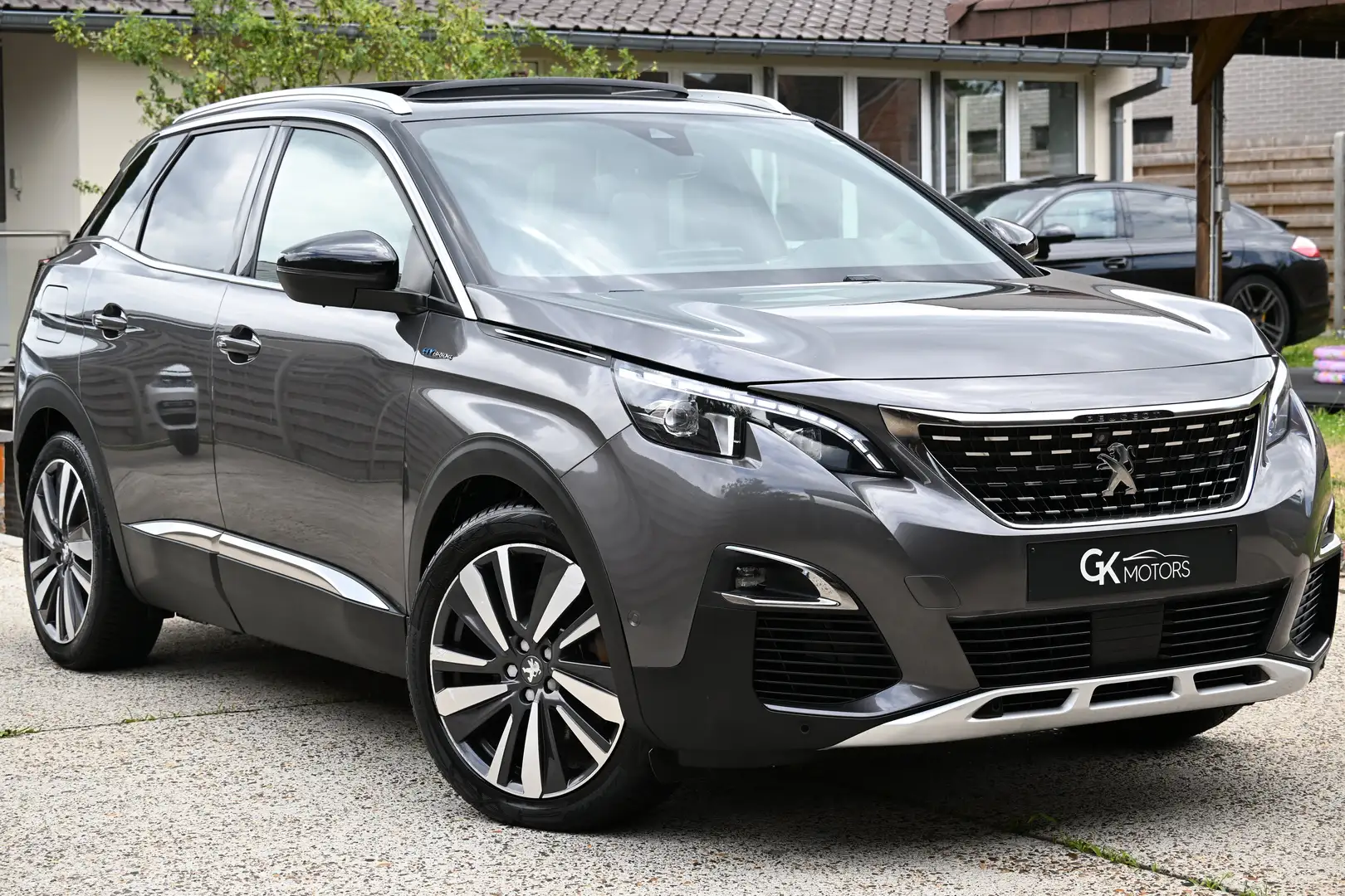 Peugeot 3008 1.6 Hybrid4 PHEV GT Line PANORAMA Camera Trekhaak Gris - 2