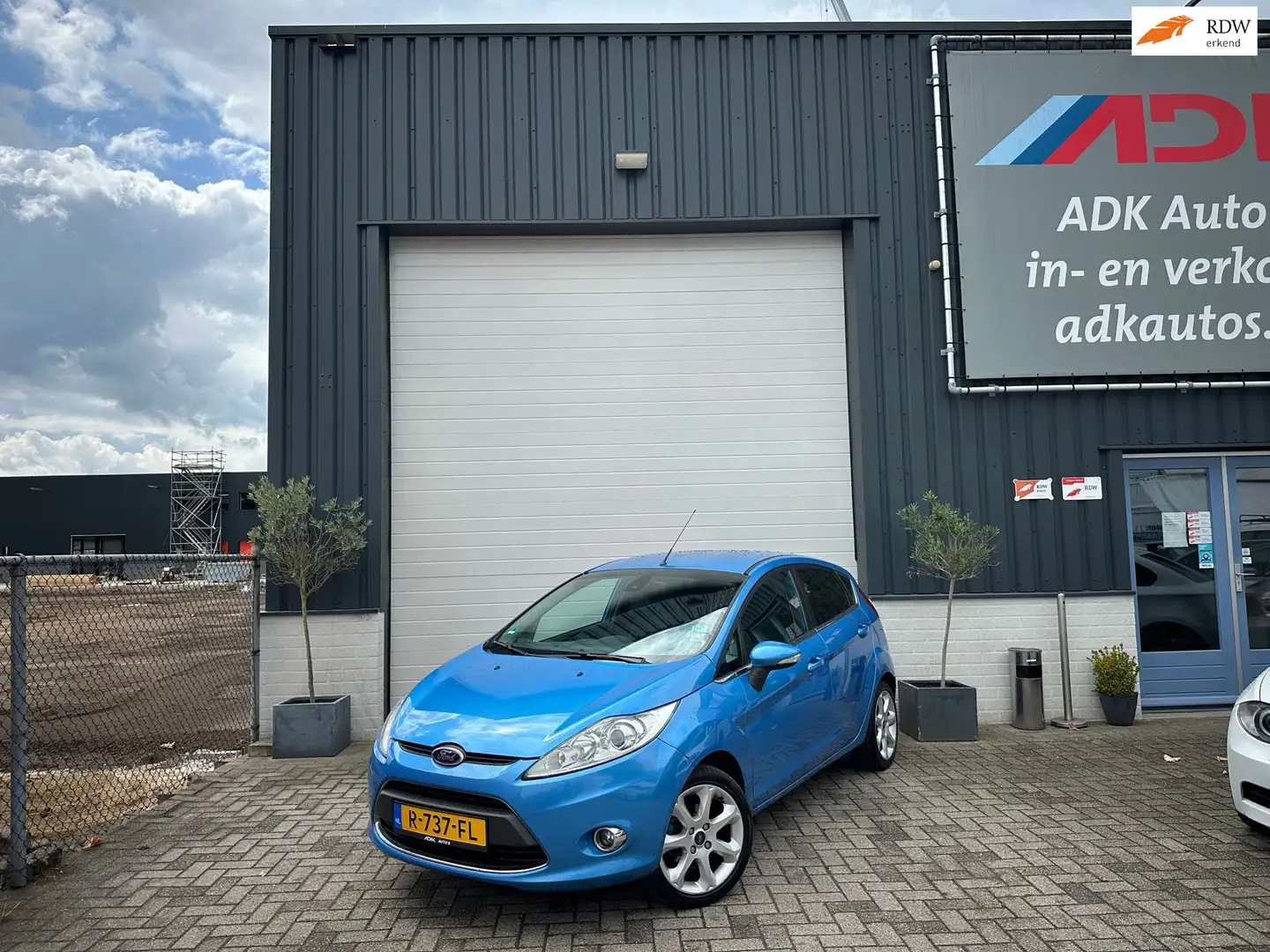 Ford Fiesta 1.25 Ghia STOELVERW/CLIMA/TREKHAAK/PDC/LM VELGEN Blauw - 1